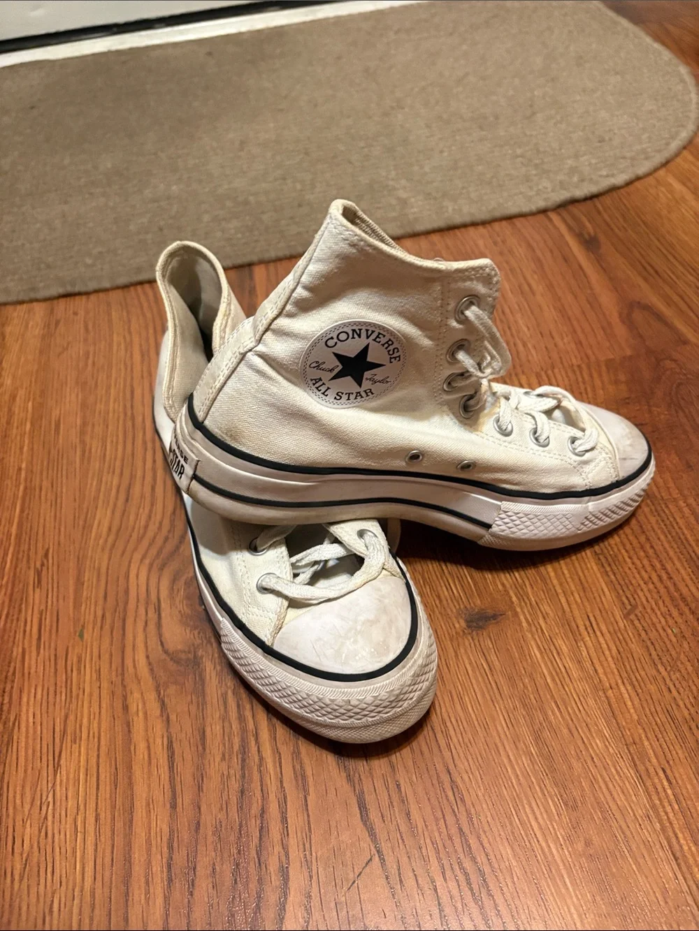 Converse High Top All Star Sneakers in Cream with Black Trim